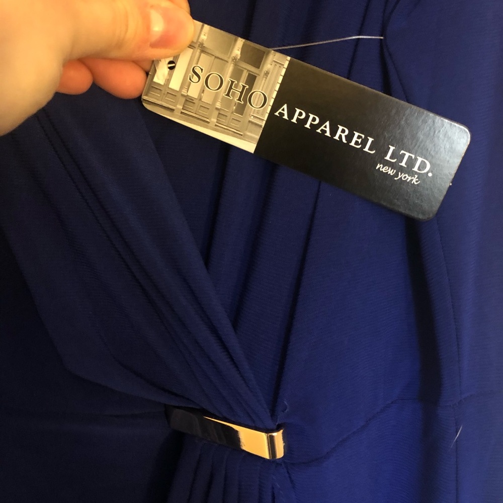 Formal dress, sleeveless. Never worn with tags.